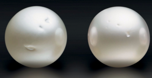 Pérolas South Sea brancas com defeitos visíveis