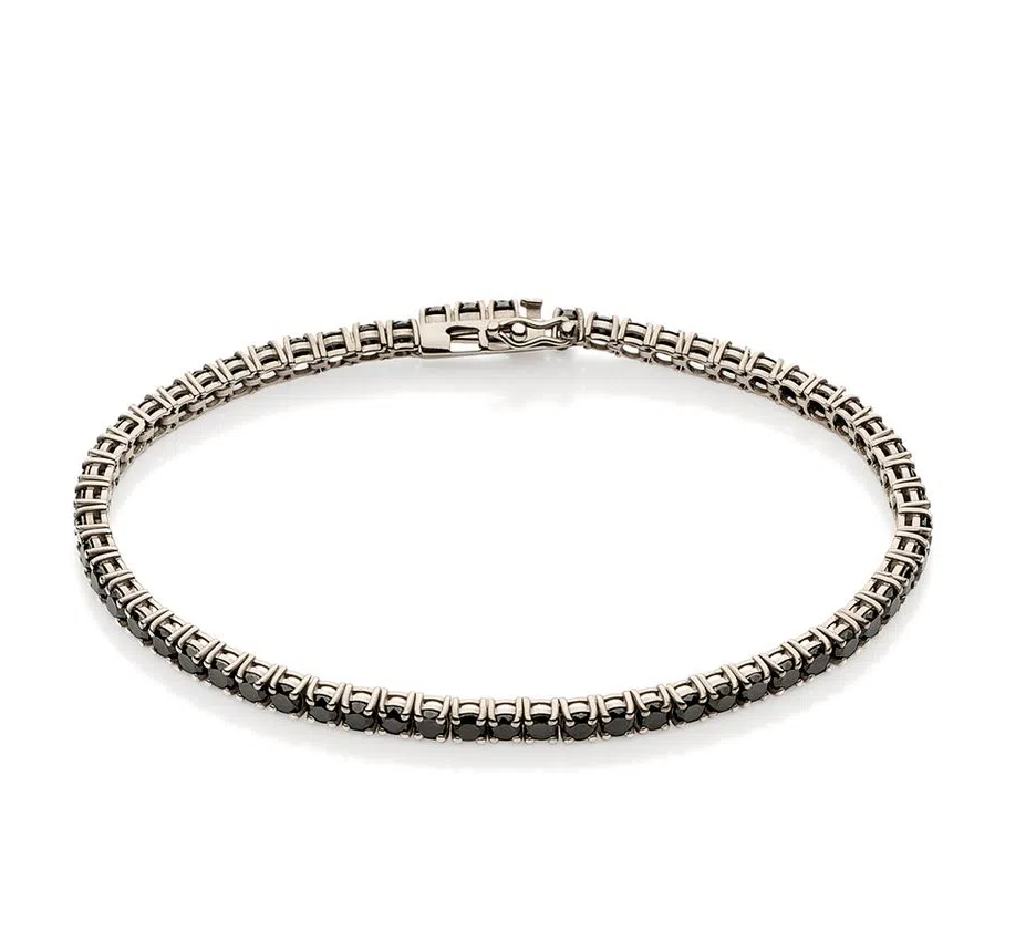 Pulseira riviera em ouro branco com diamantes black, uma peça clássica e sofisticada.