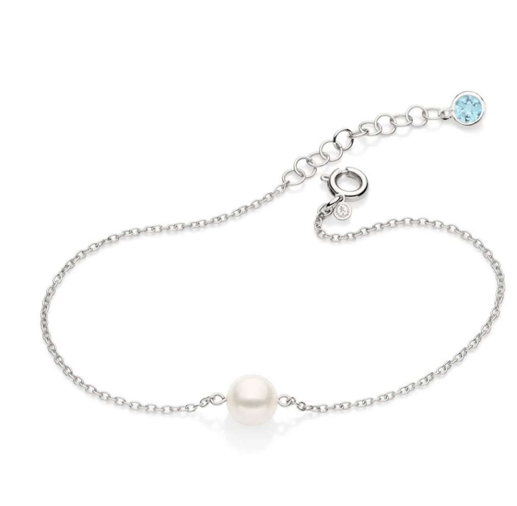 Pulseira em ouro branco com pérola Akoya e topázio azul.